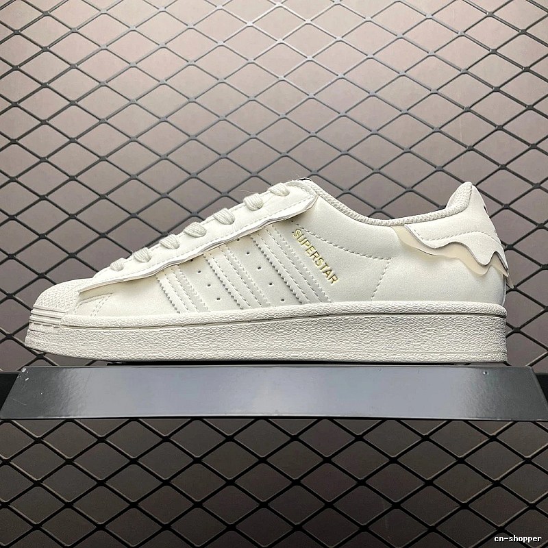 Adidas White Shell-Toe Sneakers Defined by Contrast Heel Tab