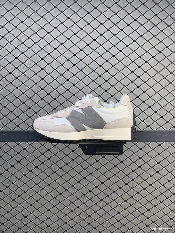 New Balance Gray Retro Runners Highlighting Road Runner Profile