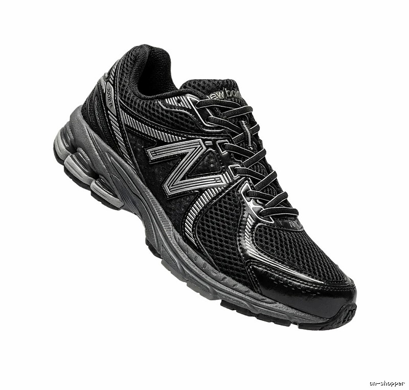 New Balance retro-style black and grey sports shoes