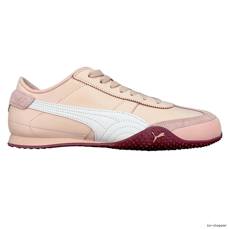 PUMA retro-style pink and white sports shoes