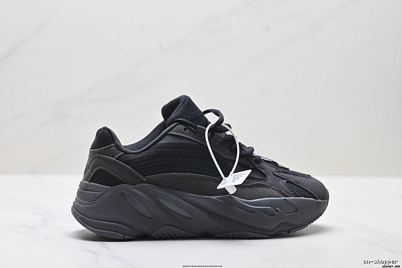 Retro-style black Yeezy 700 shoes